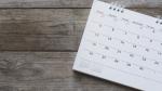 Calendar sheet on a wooden table