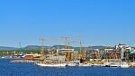 The city of Oslo hosts a myriad of tall ships and tourists during the summer Oslo in the summer seen from the seaside.