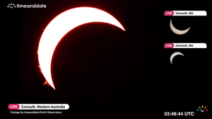 Screenshot of a live broadcast showing a partial solar eclipse in progress.