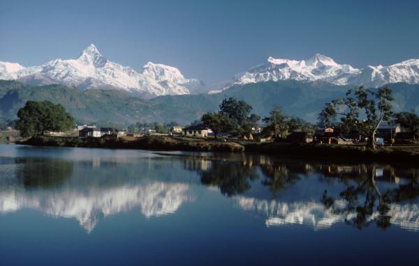 View of Machapuchare (Fishtail mountain) and the Himalaya from Damside at Pokhara, Nepal