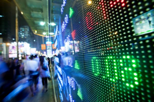 Display stock market charts in a street at night
