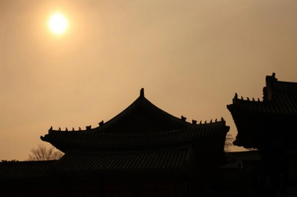 Sun above Changgyeong Palace in Seoul, South Korea