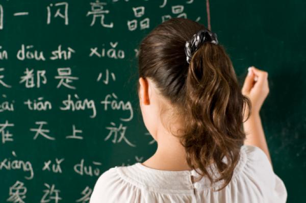 Child learning the Chinese written language.