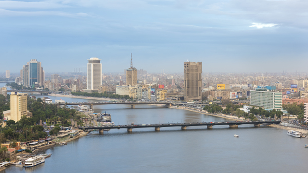 The bridge, the Nile river & the Corniche Street in central Cairo.