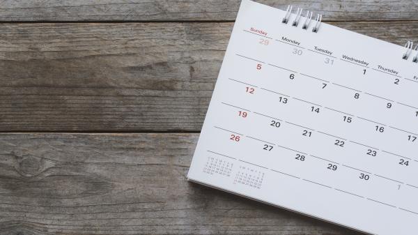 Calendar sheet on a wooden table