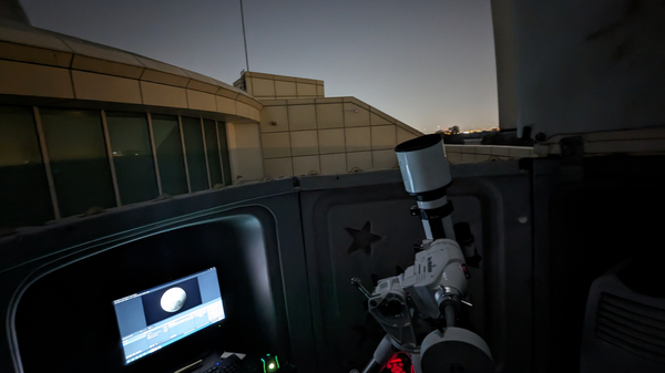 A photo of the Dubai Astronomy Group livestreaming the October 2023 lunar eclipse from the United Arab Emirates.