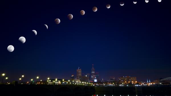 Different stages of a total lunar eclipse over Indianapolis, United States in February 2008.
