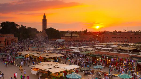Sunset at Jamaa el Fna market in Marrakesh, Morocco