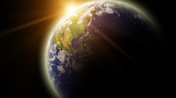 Real Earth Planet in yellow sun. Remodeled from real Earth NASA photo