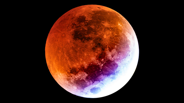 Photo taken by Dr. Thomas H. Puzia during the first partial phase of the March 2025 total lunar eclipse. A blue-ish band is clearly visible.