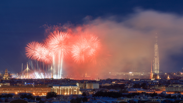 Fireworks explode above Saint Petersburg during the twilight of the Winter Nights Festival.