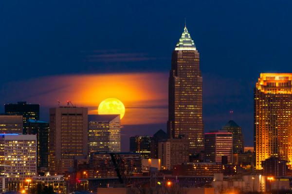 A Full Moon rising over the Cleveland skyline