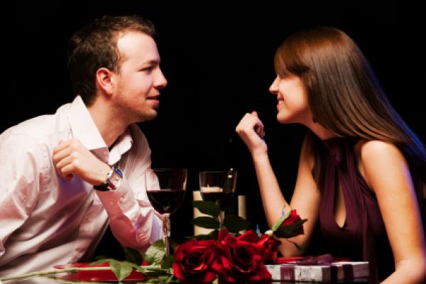 Young happy couple at the restaurant