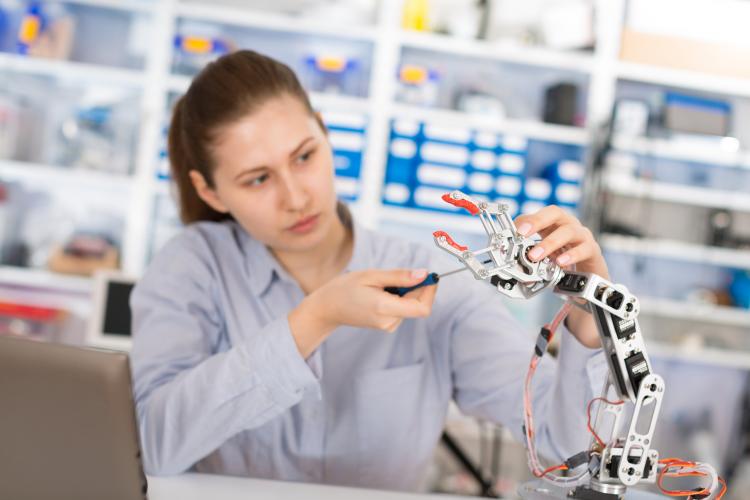 Girl in a robotics laboratory.
