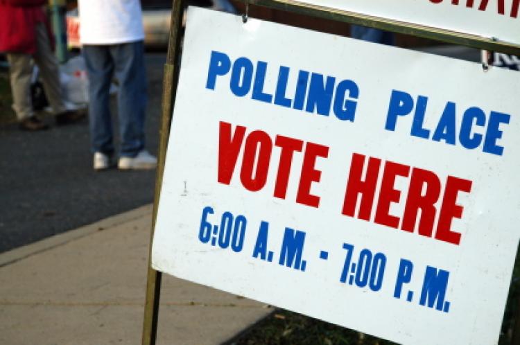 polling place with a Vote Here sign Click to see more detail. polling place with a Vote Here sign