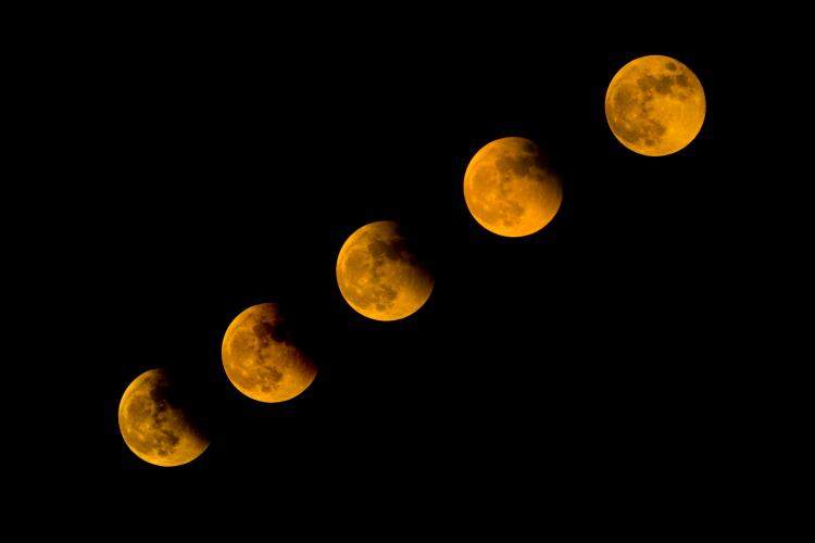 A Total Lunar Eclipse happens when the Earth moves in between the Sun and the Moon.