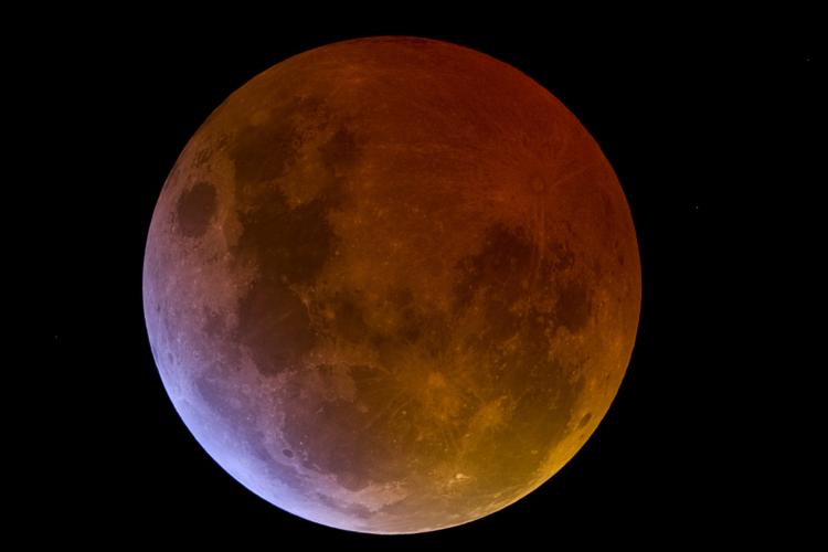 An eclipsed Moon can take on a reddish glow during totality