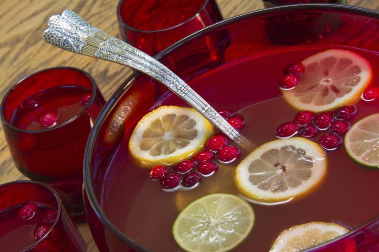 Punch bowl with cranberry punch.