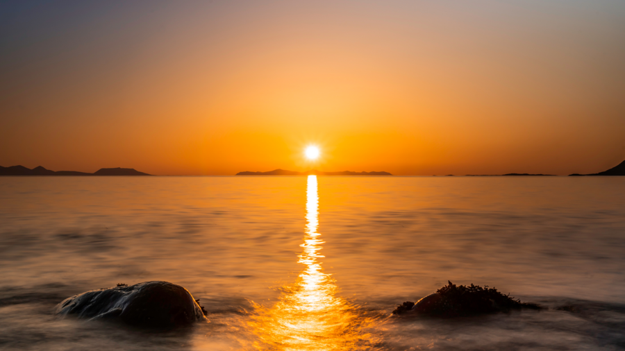 Midnight sun over Andøya island in Norway.