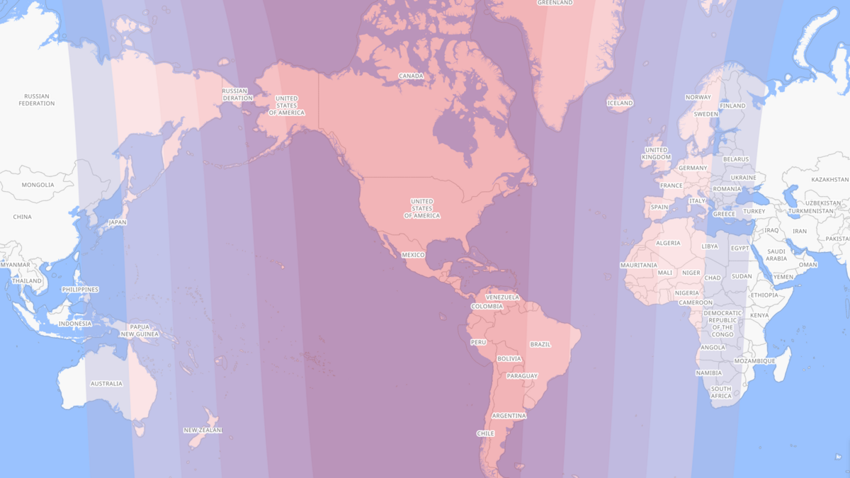 A world map with countries labeled in white text, overlaid with vertical shaded bands in varying hues of red, purple, and blue showing the area of a total lunar eclipse. The Americas are predominantly in red and pink tones, while Europe, Africa, and parts of Asia transition into shades of blue.