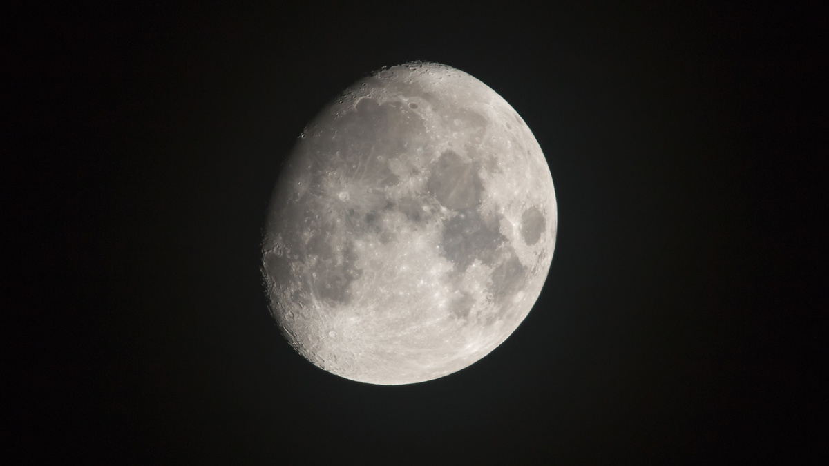 A Waxing Gibbous Moon against a black sky.