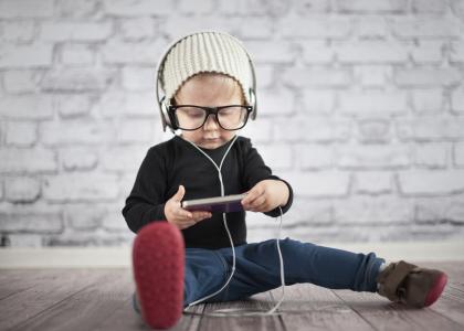 Little nerd with music player.