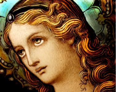 Detail shot of Mary from a stained glass window created in the late 1800's.