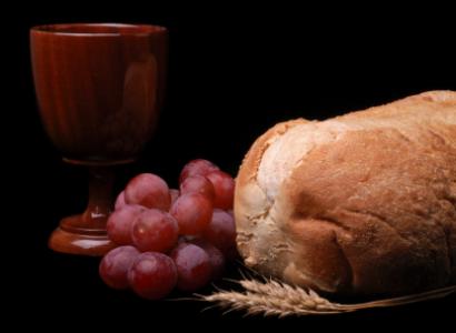 Communion elements of grapes, cup, bread, and wheat