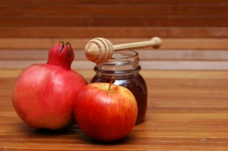 Pomegranate, apple and honey are symbols of Rosh Hashana.