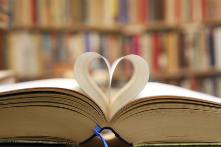 Book pages shaped into a heart.