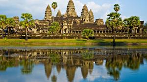 The Angkor Wat temple in Cambodia reflected in the water.