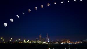 Different stages of a total lunar eclipse over Indianapolis, United States in February 2008.
