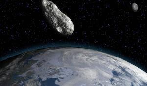A 3-D rendering of an asteroid and the Earth by an artist.