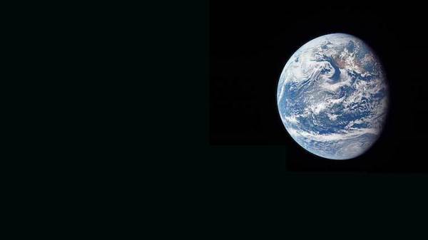 The Earth in space, as seen by the crew of Apollo 11.