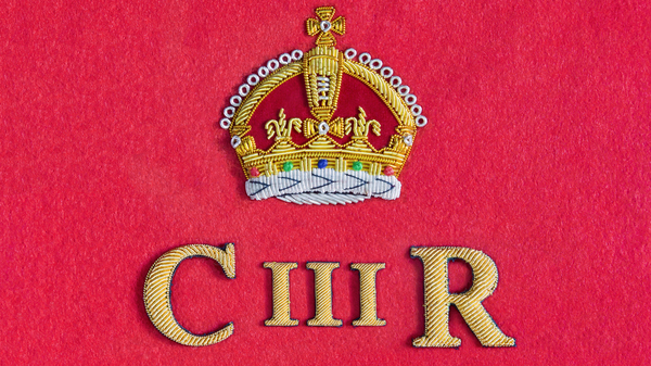 Embroidered regnal insignia of King Charles III of the United Kingdom