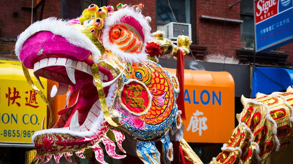 Traditional Chinese Dragon parades at the Lunar New Year Festival in Chinatown, New York, USA on Feb 2, 2014.