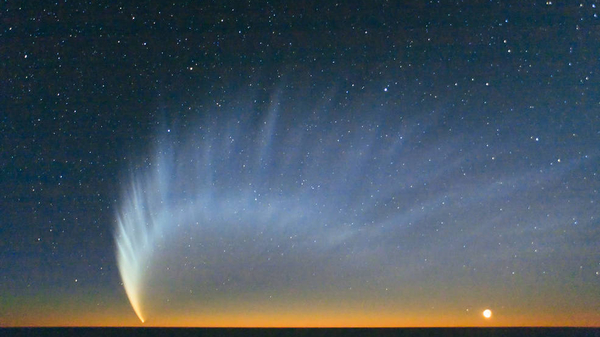 Comet McNaught appears over the Pacific Ocean in January 2007.