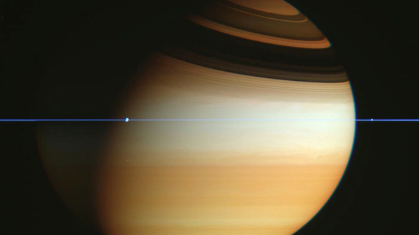 ESA - Hubble finds Saturn's rings heating its atmosphere