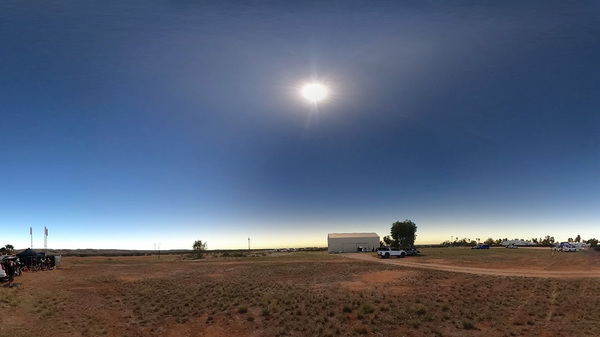 Photo of moon shadow sweeping out during total solar eclipse Exmouth, Australia