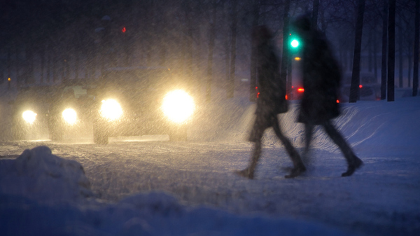 [Image: people-walking-in-front-of-cars-snow.jpg?1]