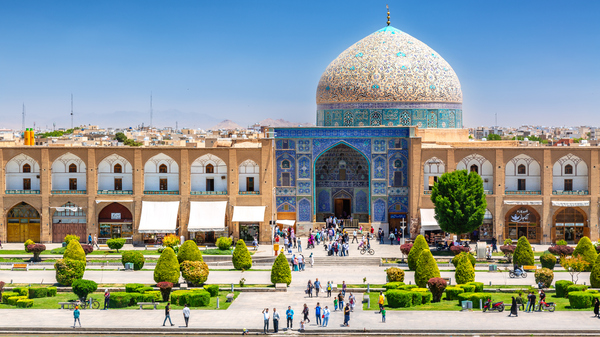 An Iranian mosque in bright colors on a sunny day.