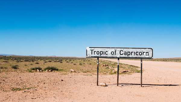 A sign marking the Tropic of Capricorn in Namibia in southern Africa.