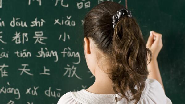 Child learning the Chinese written language.