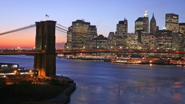 View of Lower Manhattan and East River in winter twilight, NYC, New York