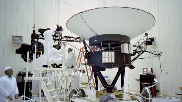 NASA engineers work on the Voyager 2 spacecraft on March 23, 1977.