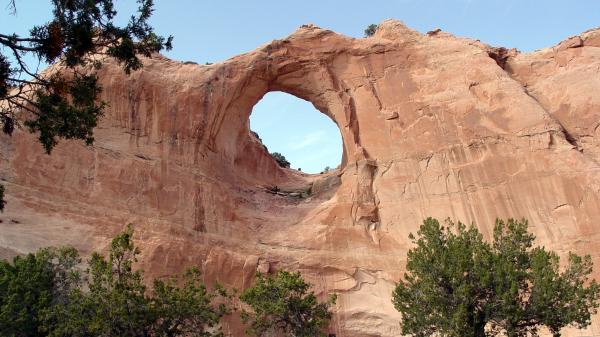Sandstone formation with a window-like hole called Window Rock in Arizona.