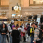 People in Grand Central Terminal by the Golden Clock. 