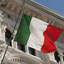 Italian flag blowing in Piazza dell'Unità, Trieste.