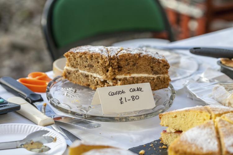 Home made carrot cake for sale at food market.