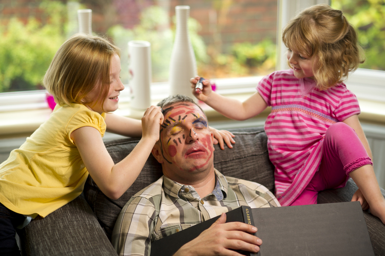 April Fool's Day can get pretty 'paint' as kids paint on their dad's face while he's asleep